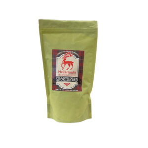 alt= green bag of shortbread mix with a red deer on a white background