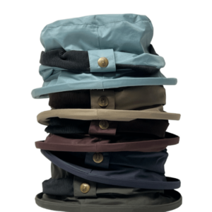 alt= a collection of six different colored jack murphy rain hats