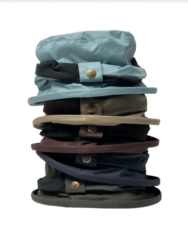 alt= a collection of six different colored jack murphy rain hats