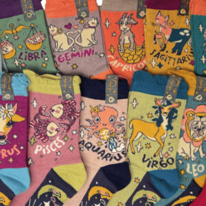 alt= a collection of colorful powder socks depicting the zodiac signs