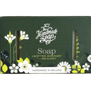 alt= green box of soap with a floral pattern on a white background