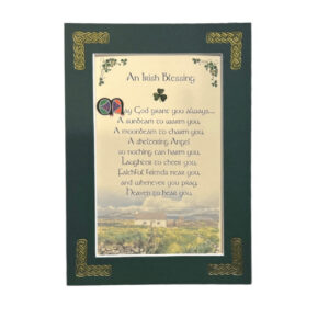 alt= An Irish blessing with a green border with a picture depicting the Irish country side on a white background