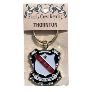 alt= a family crest keychain depicting the Thornton family crest