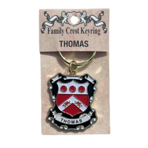 alt= a family crest keychain depicting the Thomas family crest
