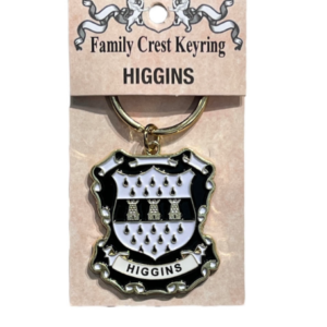 alt= a family crest keychain depicting the Higgins family crest on a white background