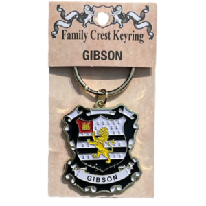 alt= a family crest depicting the Gibson family crest on a white background