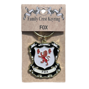 alt= a family crest keychain depicting the Fox family crest on a white background