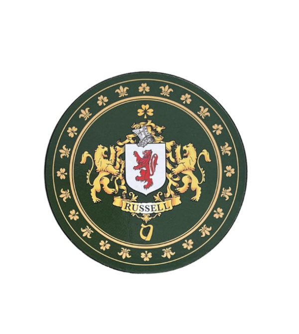 alt= a green family crest coaster depicting the Russell family crest with gold detailing on a white background