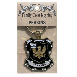 alt= a family crest keychain depicting the Perkins family crest on a white background