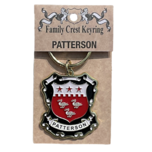 alt= a family crest keychain depicting the Patterson family crest on a white background