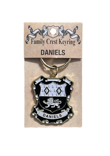 alt= a family crest keychain depicting the Daniels family crest on a white background