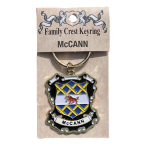 alt= a family crest keychain depicting the McCann family crest on a white background