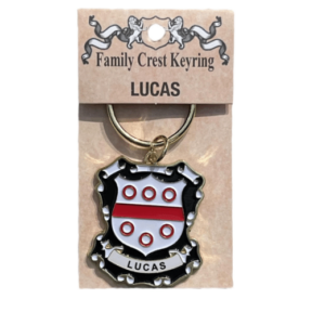 alt= a family crest keychain depicting the Lucas family crest on a white background