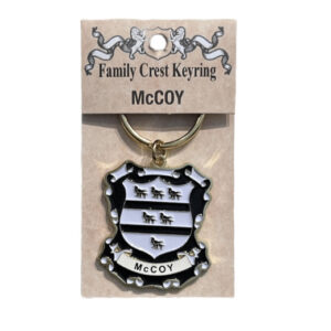 alt= a family crest keychain depicting the McCoy family crest on a white background
