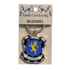 alt= a family crest keychain depicting the McDaniel family crest on a white background