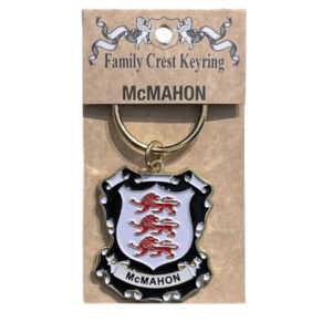 alt= a family crest keychain depicting the McMahon family crest on a white background