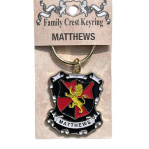 alt= a family crest keychain depicting the Matthews family crest on a white back ground