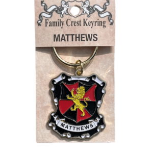 alt= a family crest keychain depicting the Matthews family crest on a white back ground