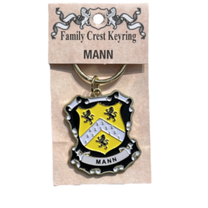 alt= a family crest keychain depicting the Mann family crest on a white background