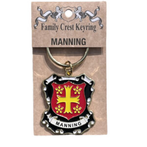 alt= a family crest keychain depicting the Manning family crest on a white back ground