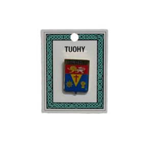 alt= a family crest pin depicting the Tuohy family crest