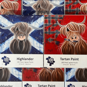 alt= an assortment of puzzles featuring highland cows