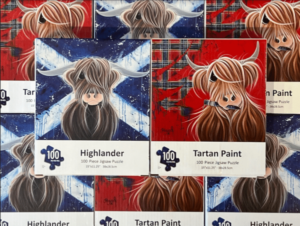 alt= an assortment of puzzles featuring highland cows