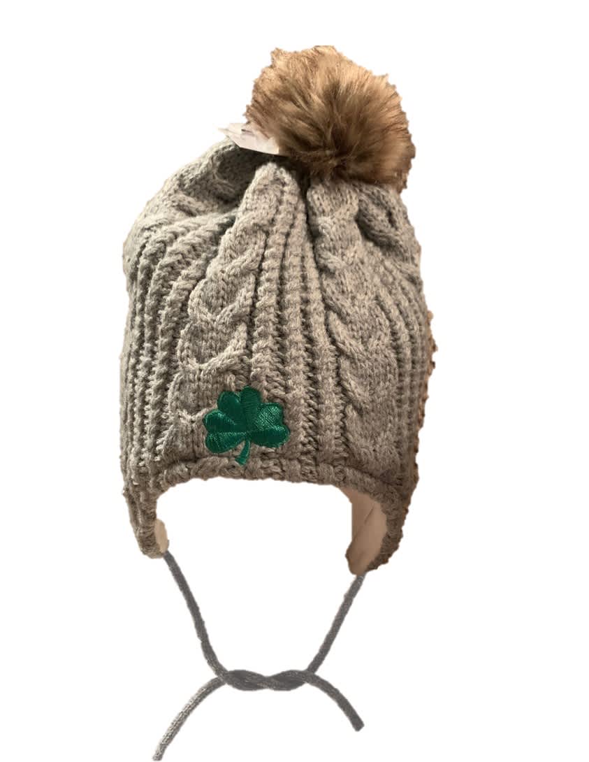 alt= brown furry top kids hat with green shamrock