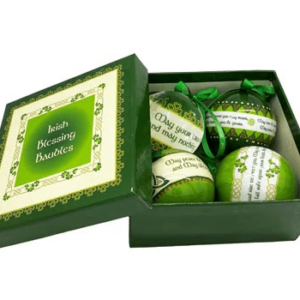 alt= a gift set of four green and white ornament bauble depicting a shamrock and the word Ireland