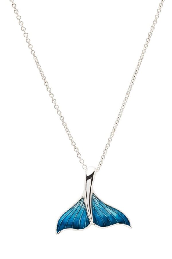 alt= sterling silver blue whale fin necklace sits on white background