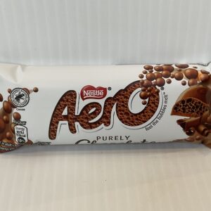 Aero Milk 36g in pure white packaging with rich brown bubbles; evokes Scottish tradition, celebrating chocolates melting magic.