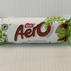 The Irish-inspired Aero Mint 36g bar, wrapped in a creamy white and emerald design, sits elegantly against a pristine backdrop.