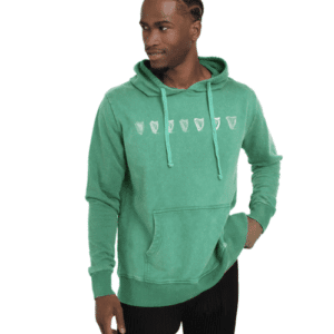 Irish man in a green Guinness Harp hoodie with Celtic knotwork and harp motifs, blending heritage style and modern comfort.