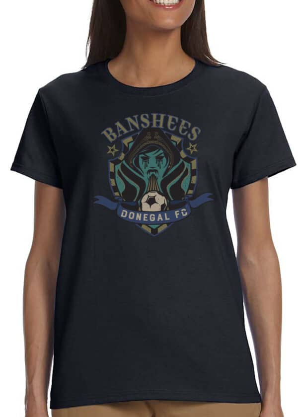 Irish woman in black tee adorned with Banshees Donegal FC’s blue banshee crest, Celtic knotwork, and heritage ribbon.