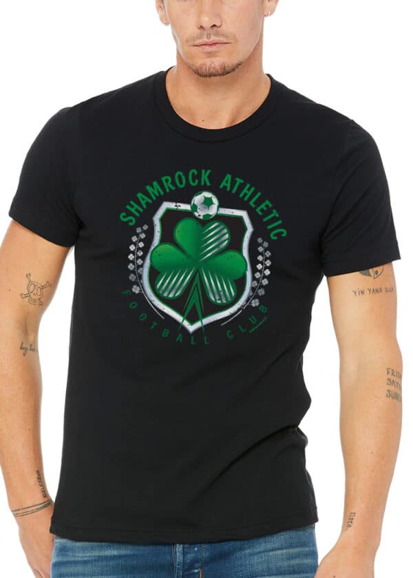 Irish heritage t-shirt in rich black cotton, featuring a vivid green Celtic shamrock and classic football motif for club pride.