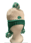 Irish-inspired kids’ hat, cream and green knit, shamrock motif, cozy pom-poms, warm wool-blend; festive for St. Patrick’s Day.