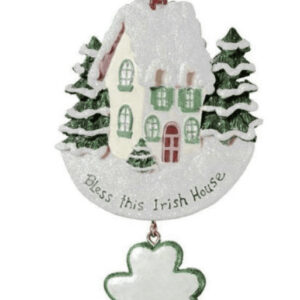 Handcrafted Irish ornament: white ceramic house, green shamrock, Celtic knot motif, Bless this Irish House—symbol of welcome.
