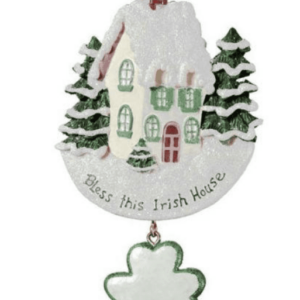 Handcrafted Irish ornament: white ceramic house, green shamrock, Celtic knot motif, Bless this Irish House—symbol of welcome.