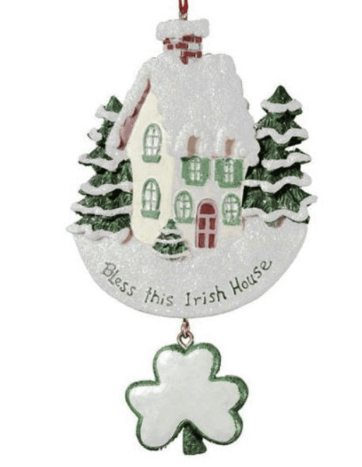 Handcrafted Irish ornament: white ceramic house, green shamrock, Celtic knot motif, Bless this Irish House—symbol of welcome.