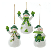 Set of three Irish snowman ornaments, each with Celtic shamrocks, green knit hats and scarves, hanging from gold cords for festive décor.