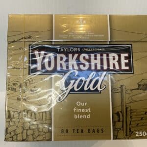 Yorkshire Gold tea box, 250g, deep gold and black hues, English heritage blend with classic landscape art; brews robust British tea.