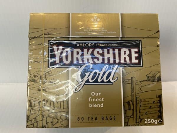 Yorkshire Gold tea box, 250g, deep gold and black hues, English heritage blend with classic landscape art; brews robust British tea.