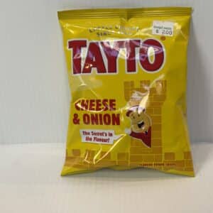 Sure! Heres a revised alt text in line with your guidelines: Irish Tayto Cheese & Onion crisps, 32.5g yellow bag, playful mascot, $2 sticker; beloved Celtic snack heritage.
