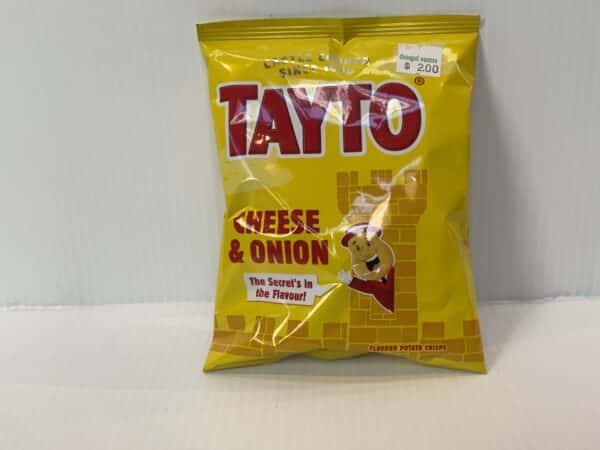 Sure! Heres a revised alt text in line with your guidelines: Irish Tayto Cheese & Onion crisps, 32.5g yellow bag, playful mascot, $2 sticker; beloved Celtic snack heritage.