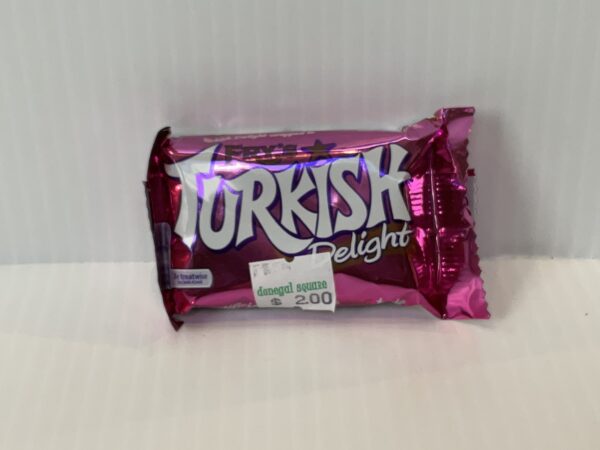 51g Fry’s Turkish Delight bar in vibrant pink wrapper with gold Celtic knot motifs, €2 Irish price tag, classic sweet treat.
