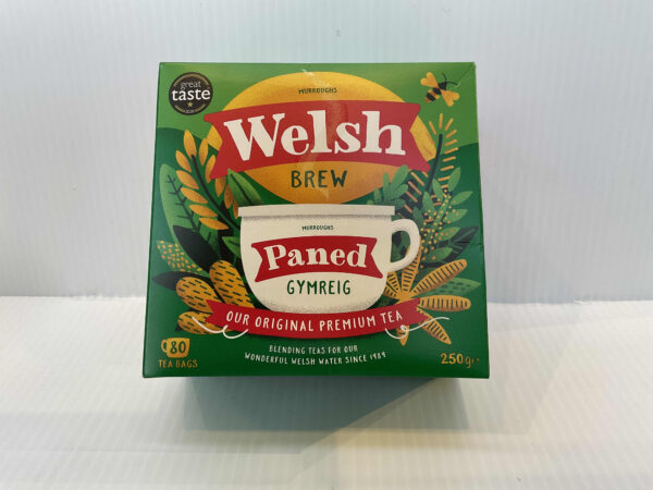 Welsh Brew tea box with Celtic knotwork, rich green hues, and “Paned Gymreig”; 80 authentic Welsh tea bags for daily brewing.