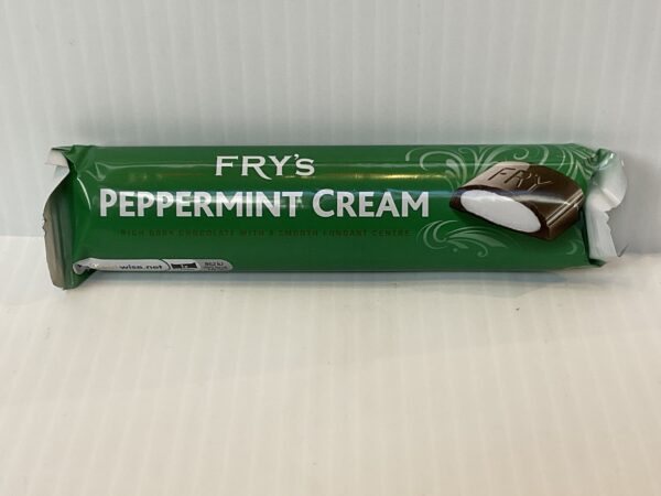 Welsh-inspired Fry’s Peppermint Cream bar in emerald foil, bearing classic Celtic knot motifs; rich dark chocolate envelops cool mint fondant.