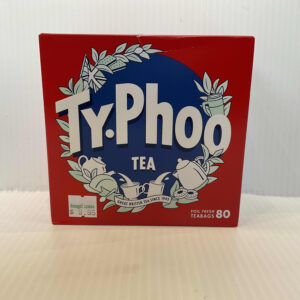 Authentic British Typhoo Tea box, vivid red with a blue circle and white teacups; classic blend for hearty, shared teatimes.