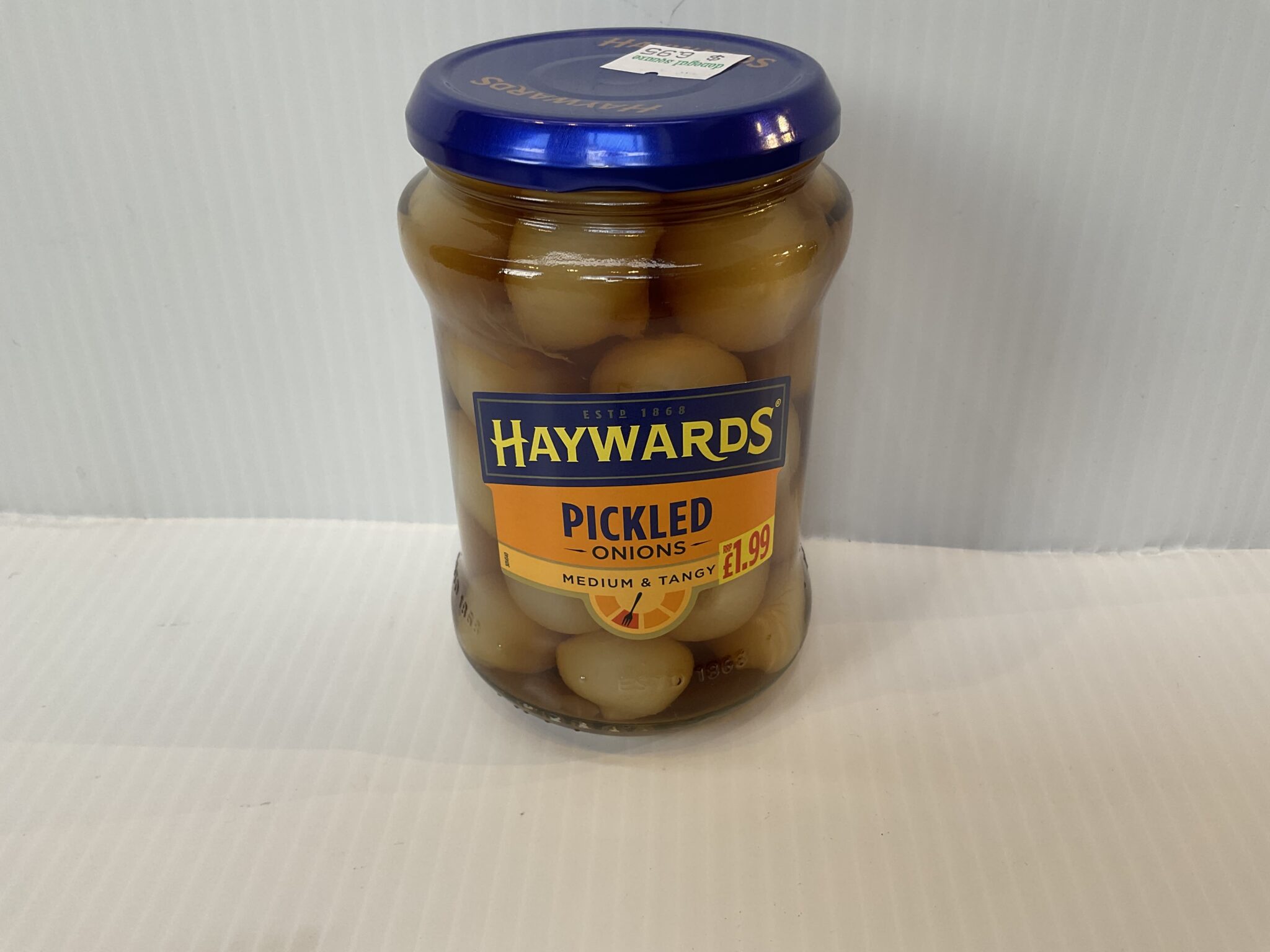 Welsh-style Haywards Pickled Onions in a 400g jar with blue lid, bold orange label; tangy, time-honored flavor for £1.99