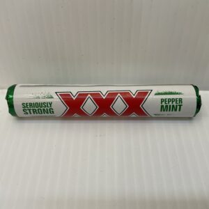 A roll of Scottish XXX Strong Mints, 40.5g, in green tartan packaging with crisp white accents—bold, authentic mint tradition.